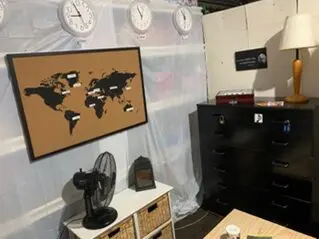 Home-made escape room with a world map on the wall