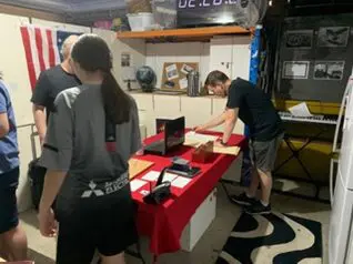 Players solving puzzles in a home-made escape room