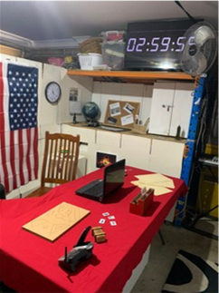 Home-made escape room with a flag and a red table