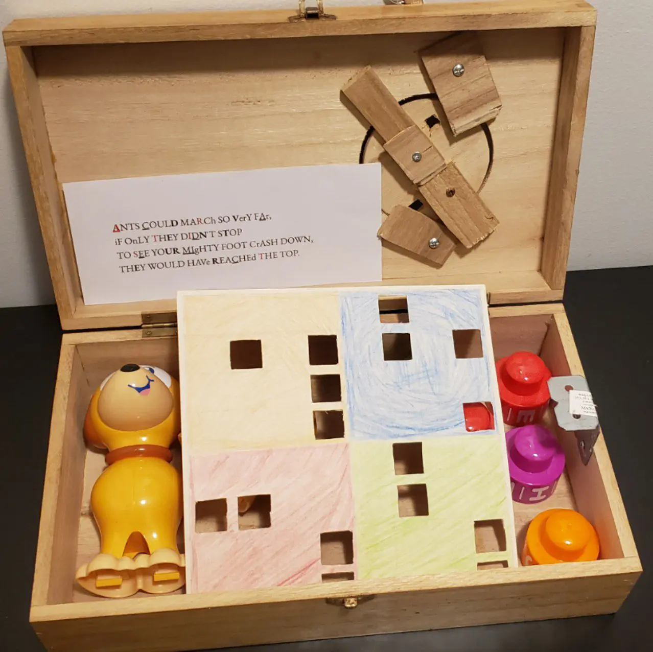 Puzzle boxes and props laid out for a home escape room