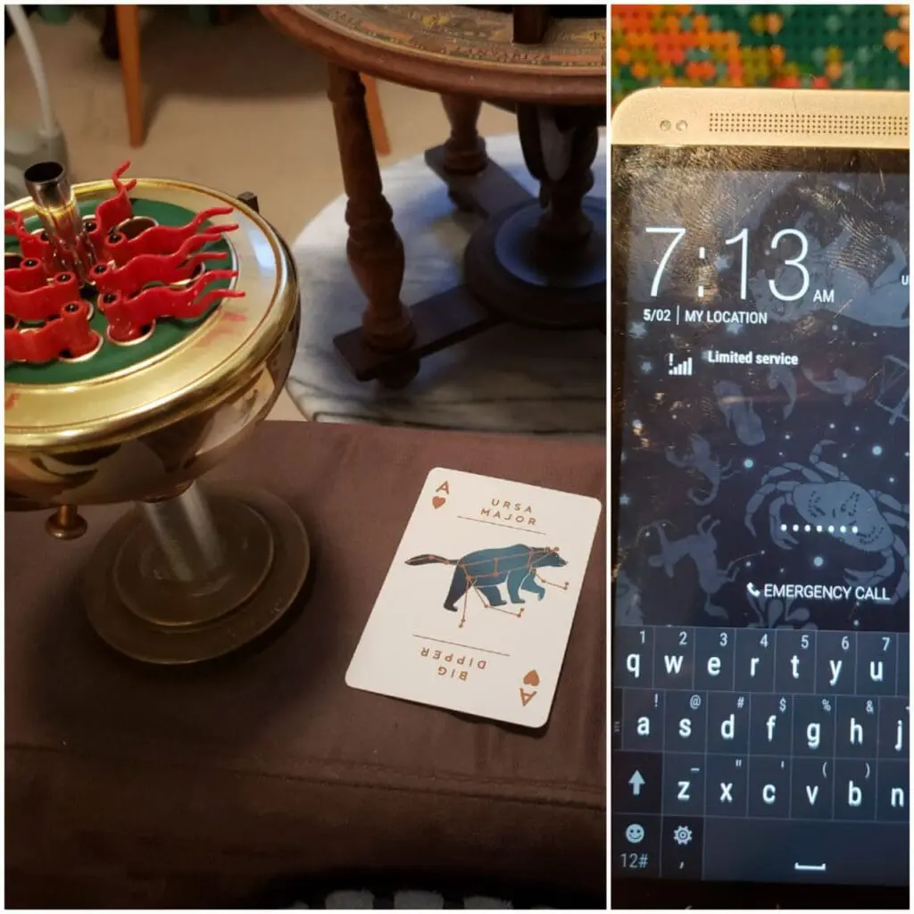 Constellation card and a phone lock screen beside a globe