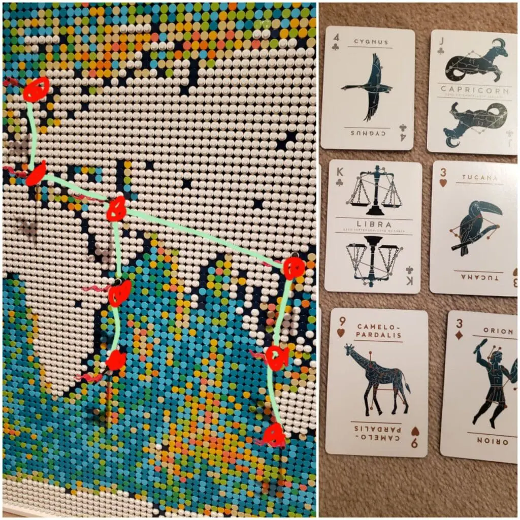 LEGO world map with flags joined by lines, beside constellation cards