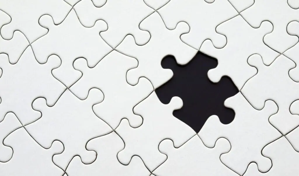 Jigsaw puzzle with one missing piece