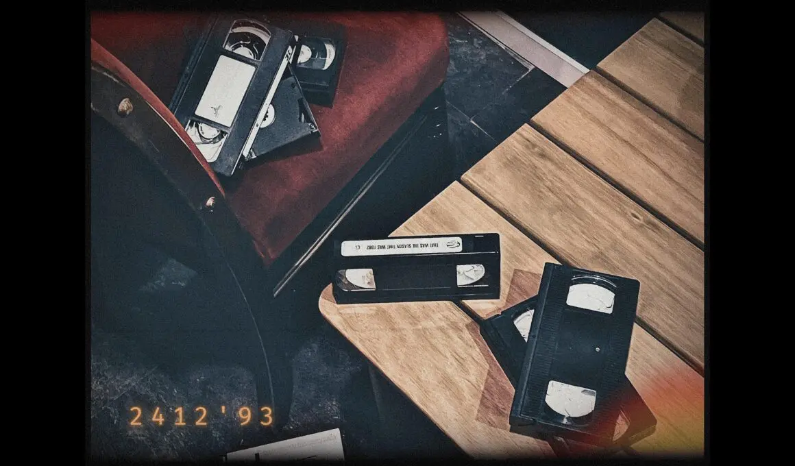 The Outsider room: VHS tapes on a wooden table